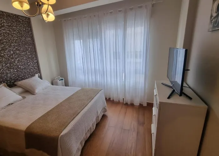 Pisos Playa Portonovo Санхенхо